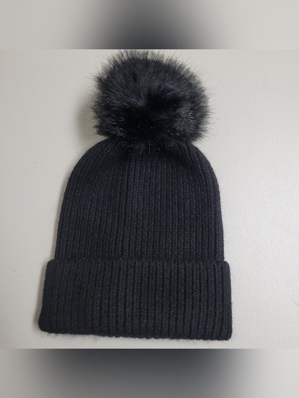 Norla Canada Black Ribbed Knit Pom Beanie.